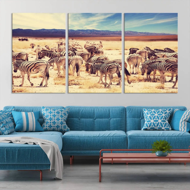 The Africa Zebras in the Savannah Canvas Wall Art Print features a zebra triptych on museum-quality canvas. This gallery-wrapped artwork is finished with a UV-protective coating, ensuring lasting vibrancy and elegance.