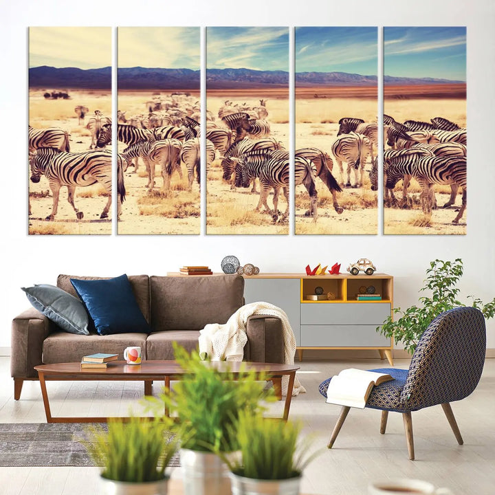 The Africa Zebras in the Savannah Canvas Wall Art Print features a zebra triptych on museum-quality canvas. This gallery-wrapped artwork is finished with a UV-protective coating, ensuring lasting vibrancy and elegance.