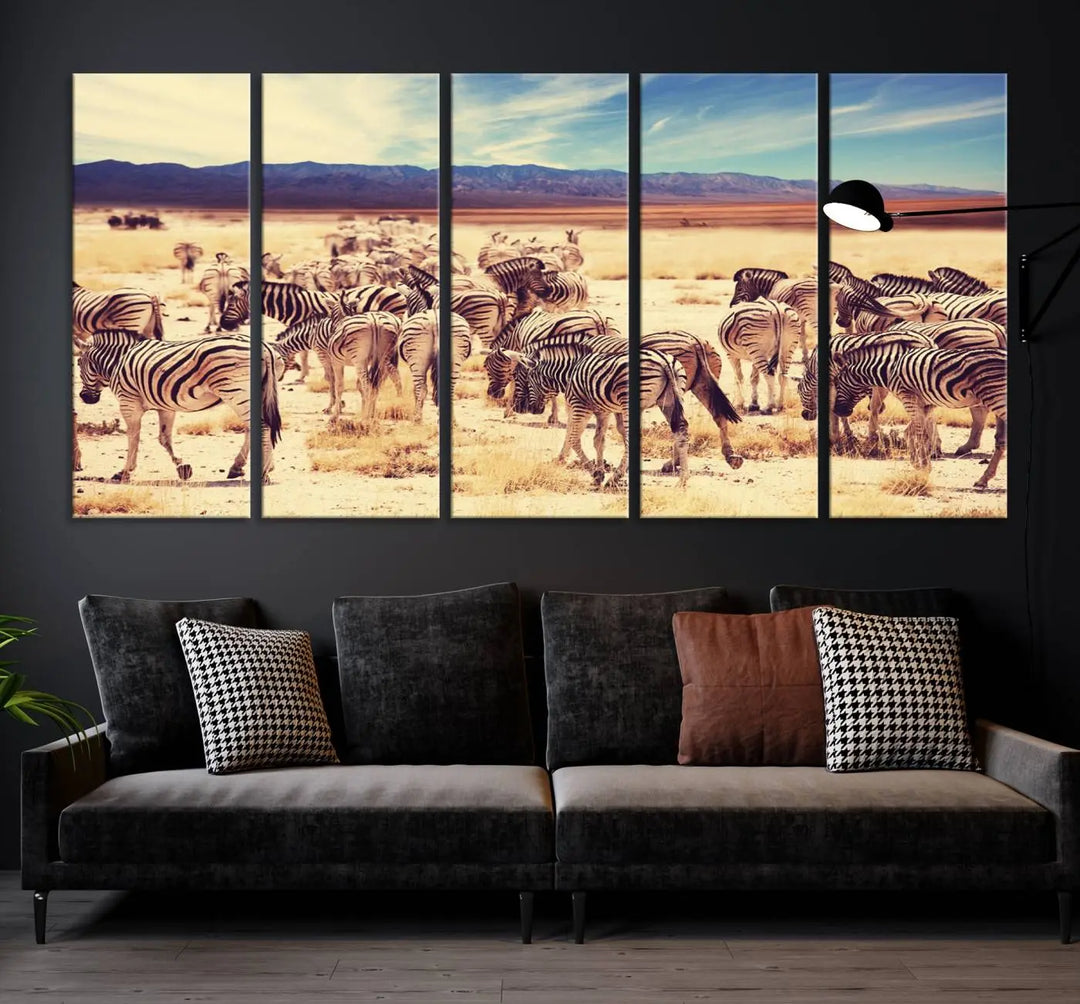 The Africa Zebras in the Savannah Canvas Wall Art Print features a zebra triptych on museum-quality canvas. This gallery-wrapped artwork is finished with a UV-protective coating, ensuring lasting vibrancy and elegance.