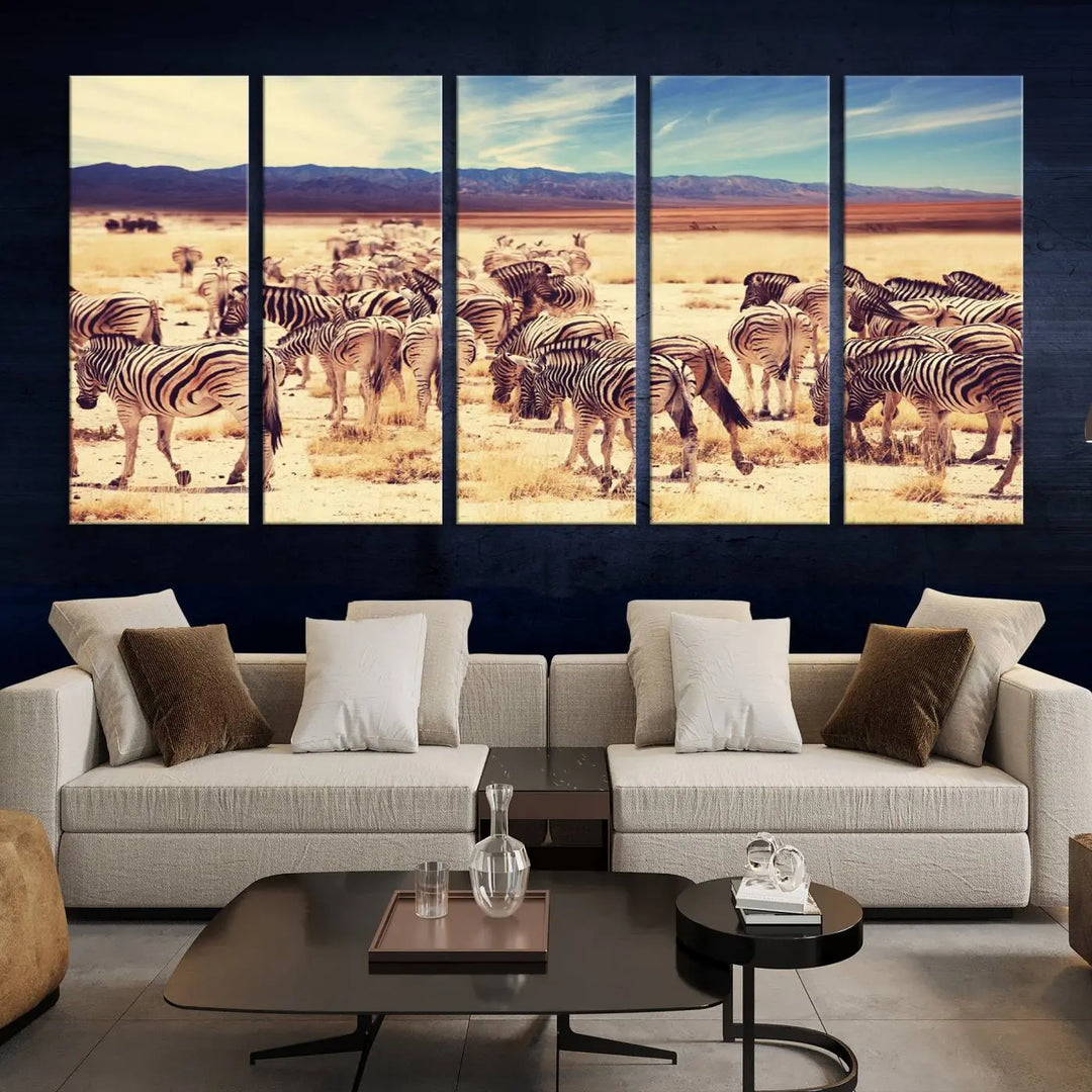 The Africa Zebras in the Savannah Canvas Wall Art Print features a zebra triptych on museum-quality canvas. This gallery-wrapped artwork is finished with a UV-protective coating, ensuring lasting vibrancy and elegance.