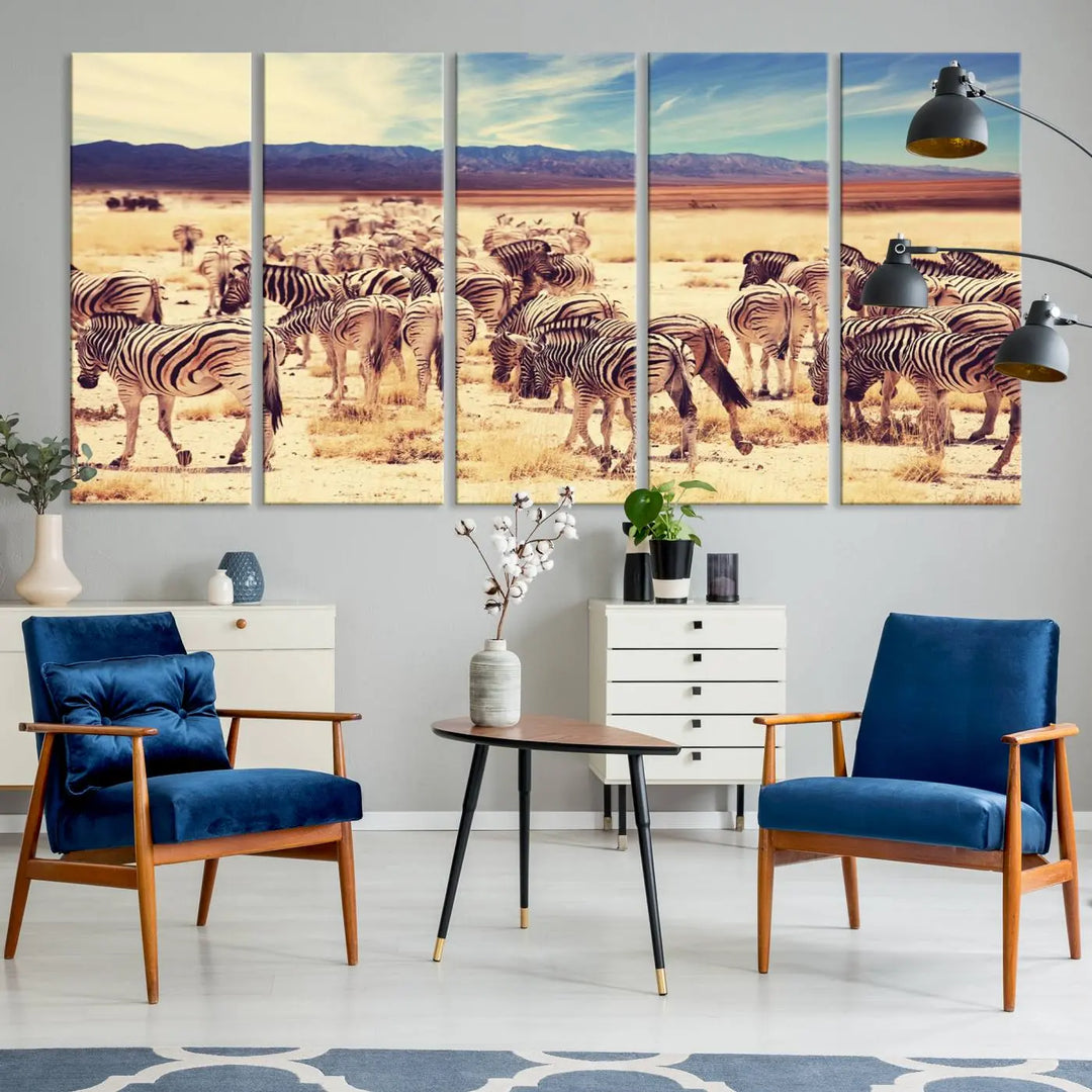 The Africa Zebras in the Savannah Canvas Wall Art Print features a zebra triptych on museum-quality canvas. This gallery-wrapped artwork is finished with a UV-protective coating, ensuring lasting vibrancy and elegance.