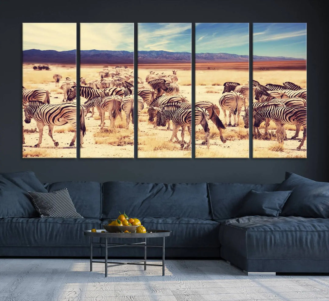 The Africa Zebras in the Savannah Canvas Wall Art Print features a zebra triptych on museum-quality canvas. This gallery-wrapped artwork is finished with a UV-protective coating, ensuring lasting vibrancy and elegance.