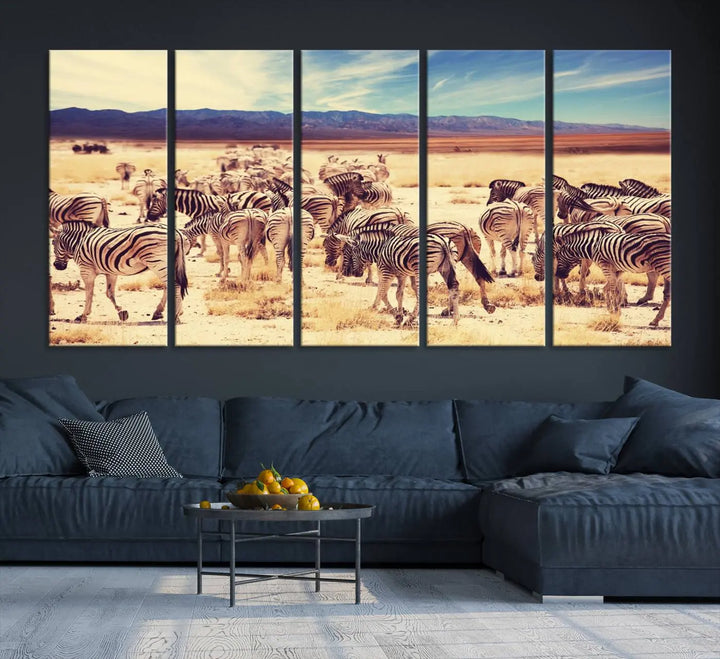 The Africa Zebras in the Savannah Canvas Wall Art Print features a zebra triptych on museum-quality canvas. This gallery-wrapped artwork is finished with a UV-protective coating, ensuring lasting vibrancy and elegance.