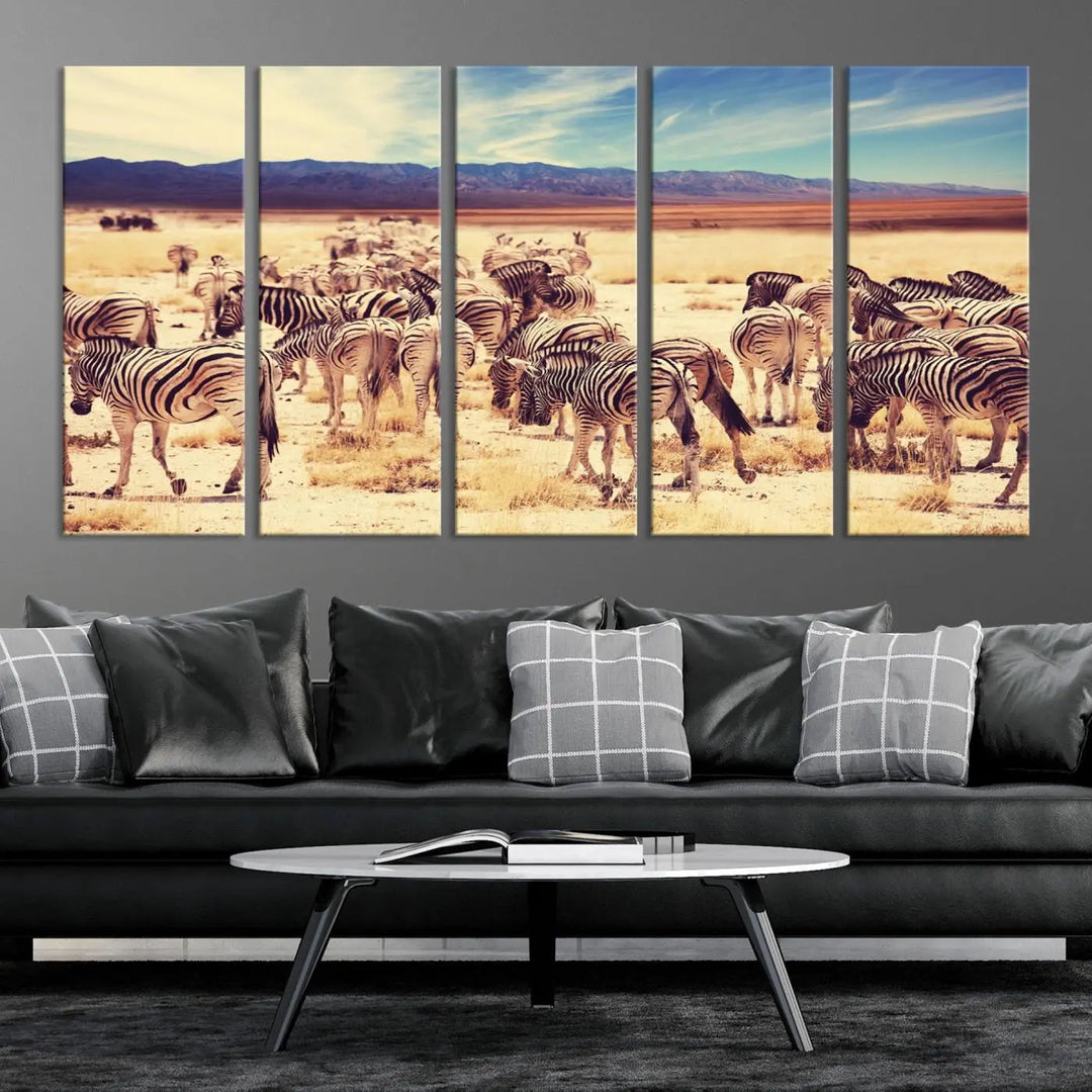 The Africa Zebras in the Savannah Canvas Wall Art Print features a zebra triptych on museum-quality canvas. This gallery-wrapped artwork is finished with a UV-protective coating, ensuring lasting vibrancy and elegance.