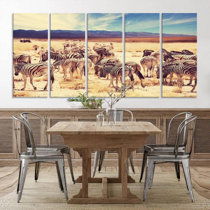 The Africa Zebras in the Savannah Canvas Wall Art Print features a zebra triptych on museum-quality canvas. This gallery-wrapped artwork is finished with a UV-protective coating, ensuring lasting vibrancy and elegance.