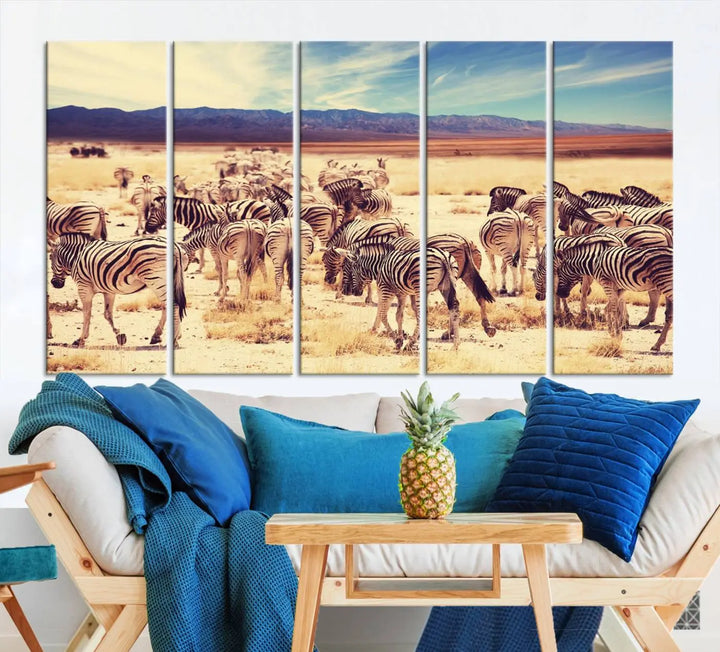 The Africa Zebras in the Savannah Canvas Wall Art Print features a zebra triptych on museum-quality canvas. This gallery-wrapped artwork is finished with a UV-protective coating, ensuring lasting vibrancy and elegance.