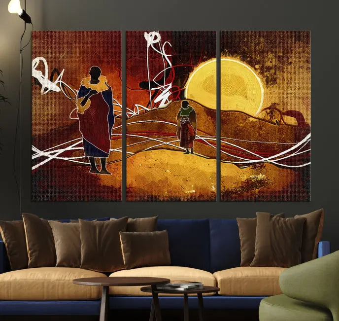 African Abstract Canvas Wall Art Print features a triptych painting of silhouettes on a warm landscape with abstract lines and a large sun. It is mounted on museum-quality canvas with a UV-protective coating.