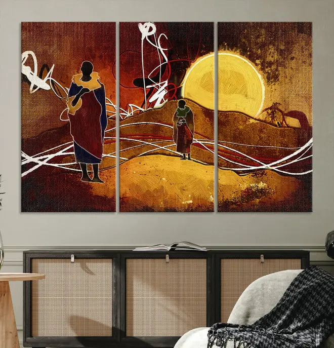 African Abstract Canvas Wall Art Print features a triptych painting of silhouettes on a warm landscape with abstract lines and a large sun. It is mounted on museum-quality canvas with a UV-protective coating.