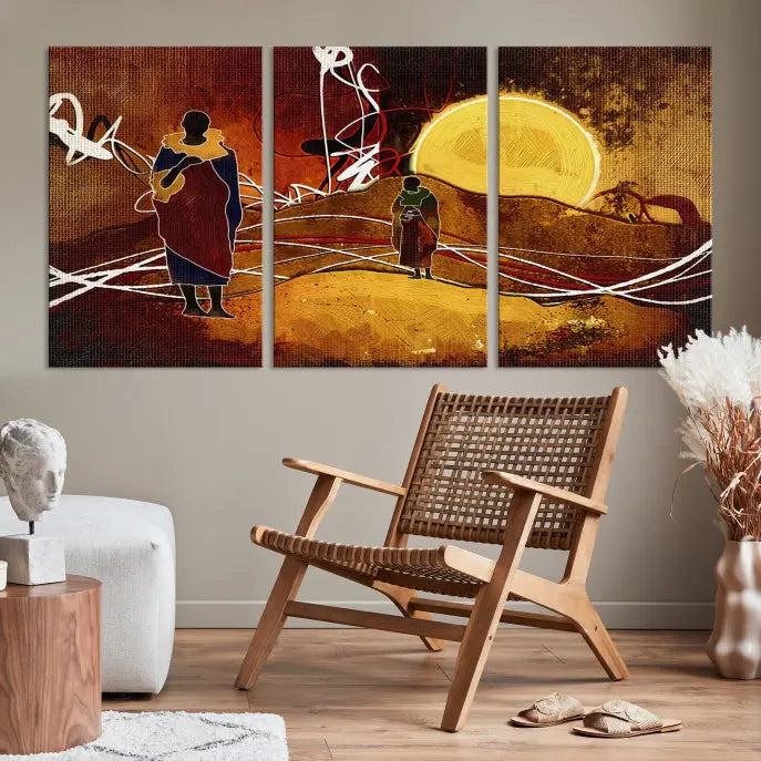 African Abstract Canvas Wall Art Print features a triptych painting of silhouettes on a warm landscape with abstract lines and a large sun. It is mounted on museum-quality canvas with a UV-protective coating.