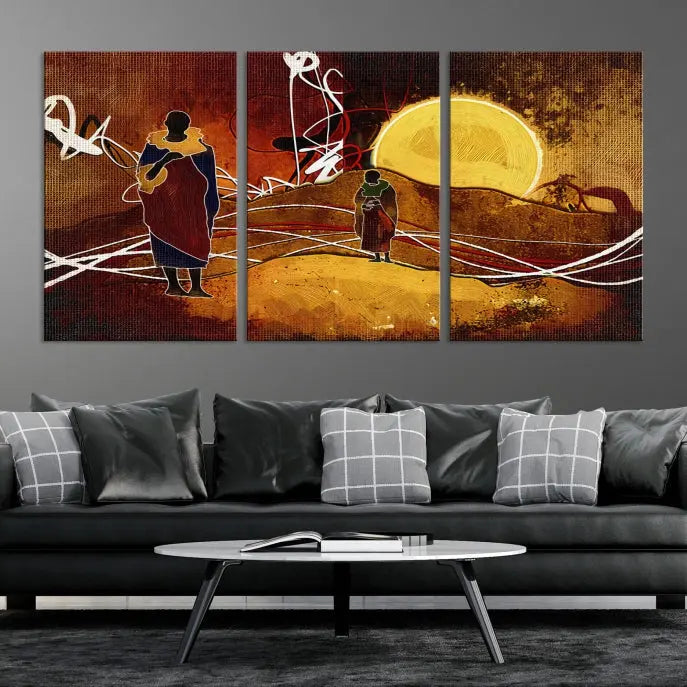 African Abstract Canvas Wall Art Print features a triptych painting of silhouettes on a warm landscape with abstract lines and a large sun. It is mounted on museum-quality canvas with a UV-protective coating.