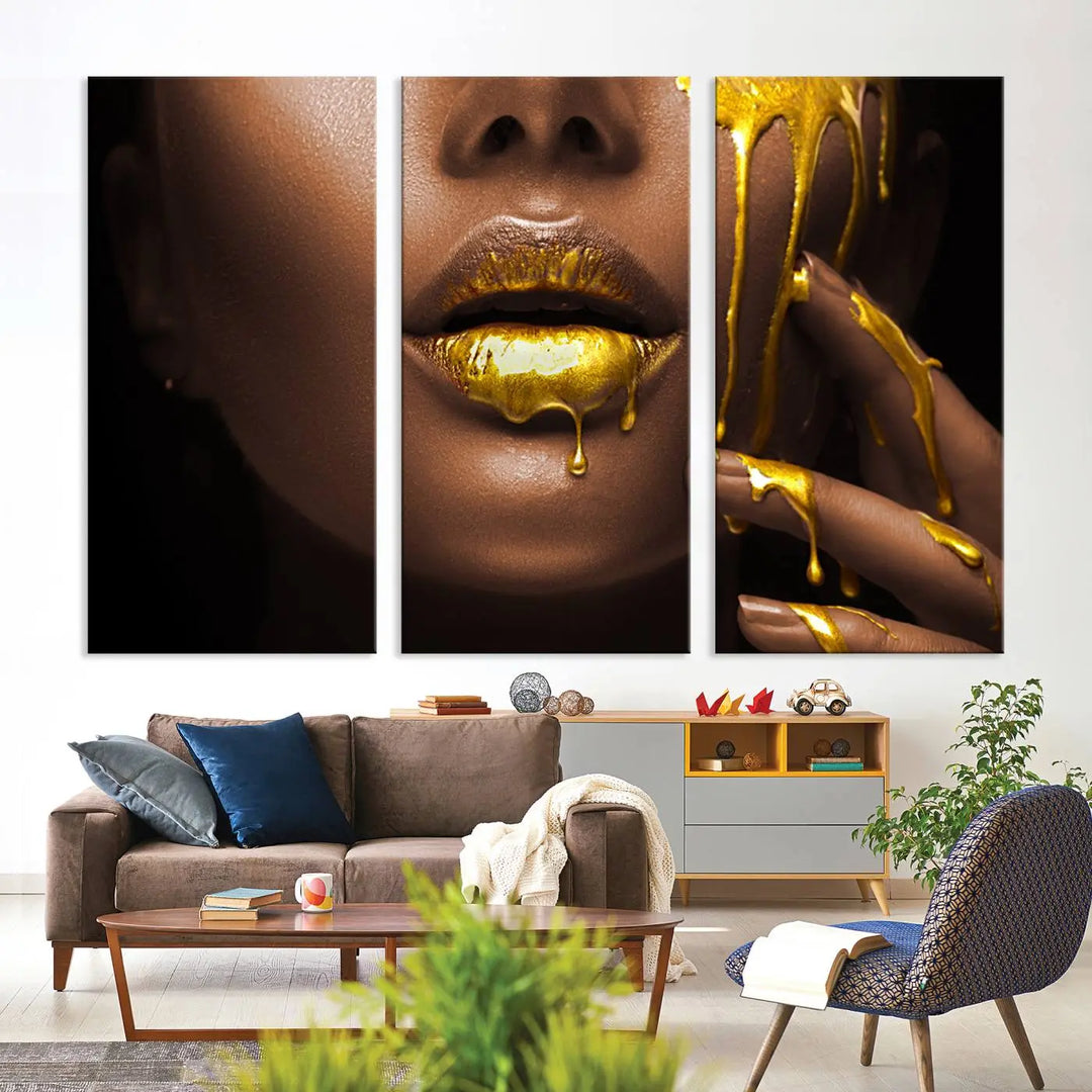 A triptych art display of the African American Art Black Woman Canvas Print, featuring gold-painted lips inspired by fashion and luxury, is elegantly arranged.