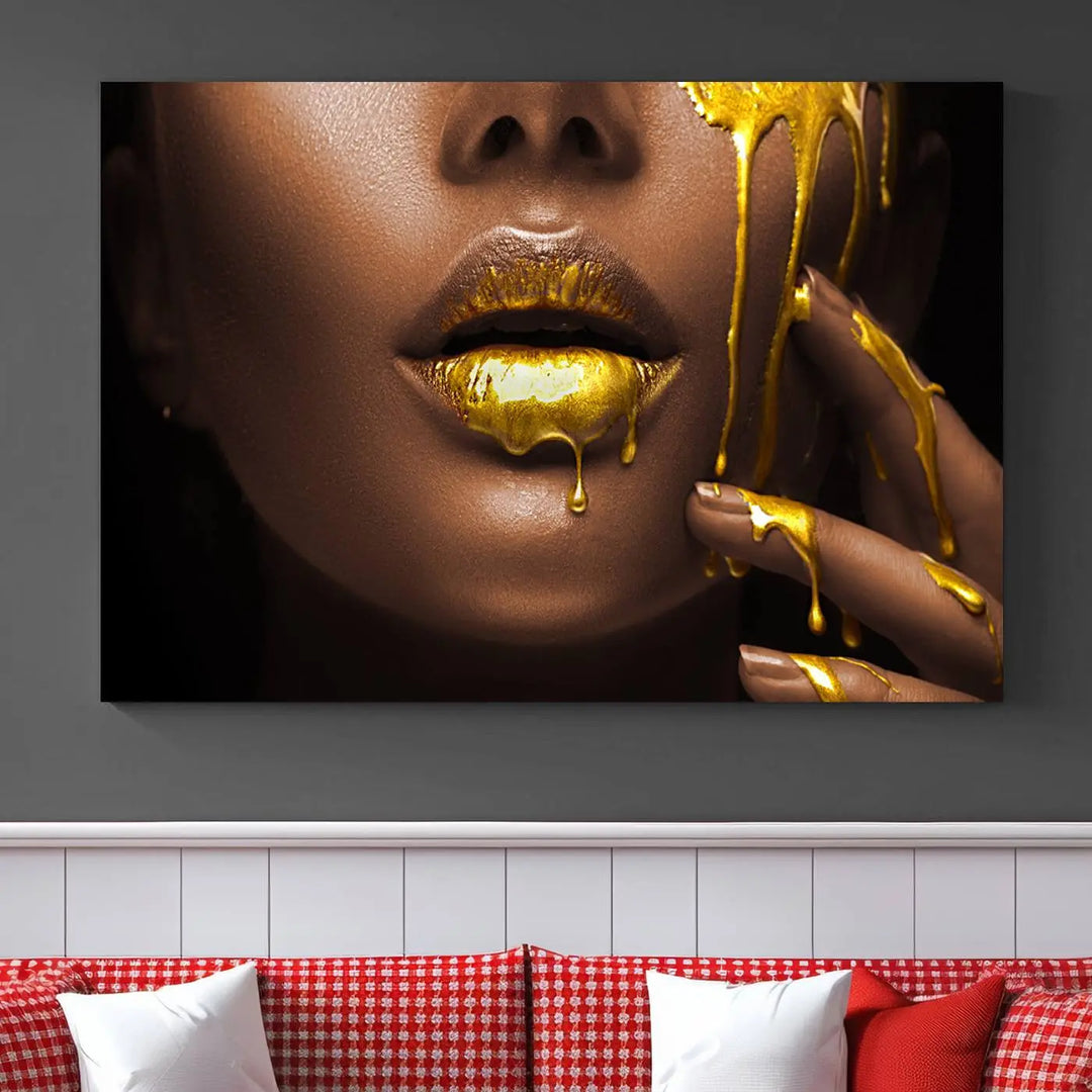 A triptych art display of the African American Art Black Woman Canvas Print, featuring gold-painted lips inspired by fashion and luxury, is elegantly arranged.