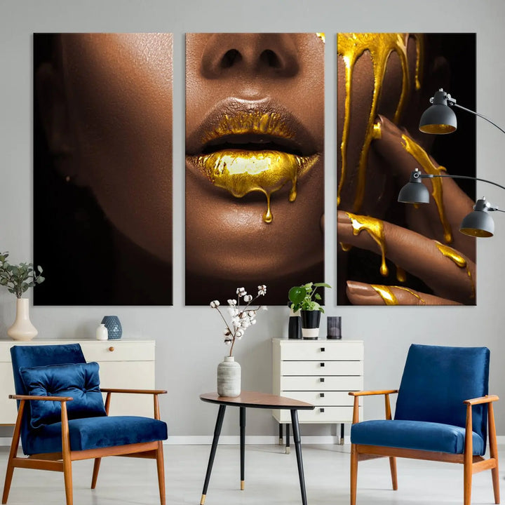 A triptych art display of the African American Art Black Woman Canvas Print, featuring gold-painted lips inspired by fashion and luxury, is elegantly arranged.