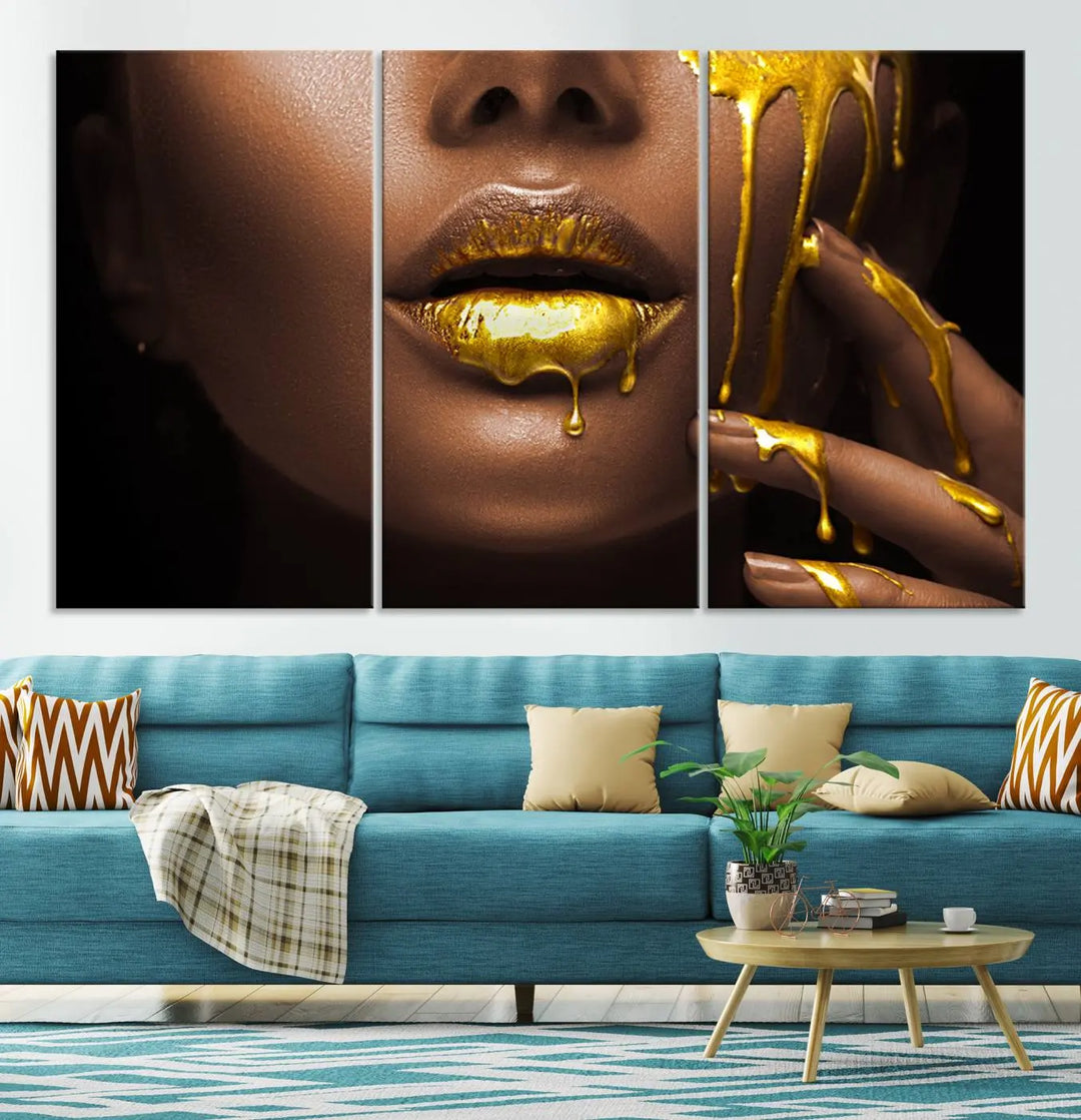 A triptych art display of the African American Art Black Woman Canvas Print, featuring gold-painted lips inspired by fashion and luxury, is elegantly arranged.