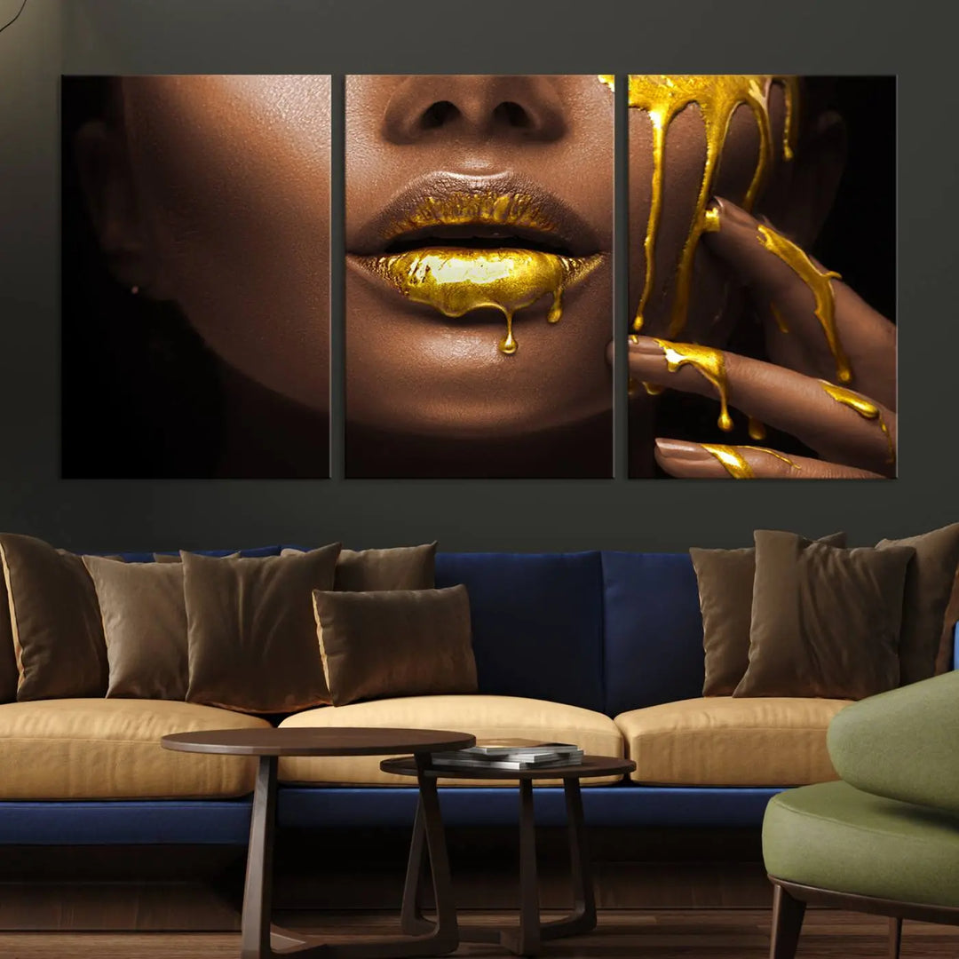 A triptych art display of the African American Art Black Woman Canvas Print, featuring gold-painted lips inspired by fashion and luxury, is elegantly arranged.