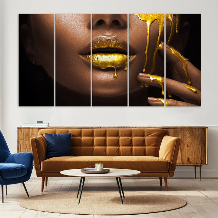 A triptych art display of the African American Art Black Woman Canvas Print, featuring gold-painted lips inspired by fashion and luxury, is elegantly arranged.