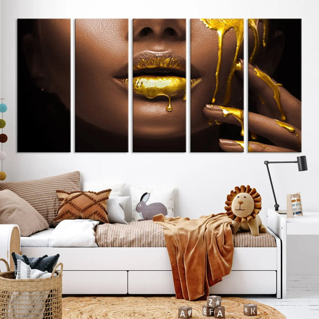 A triptych art display of the African American Art Black Woman Canvas Print, featuring gold-painted lips inspired by fashion and luxury, is elegantly arranged.