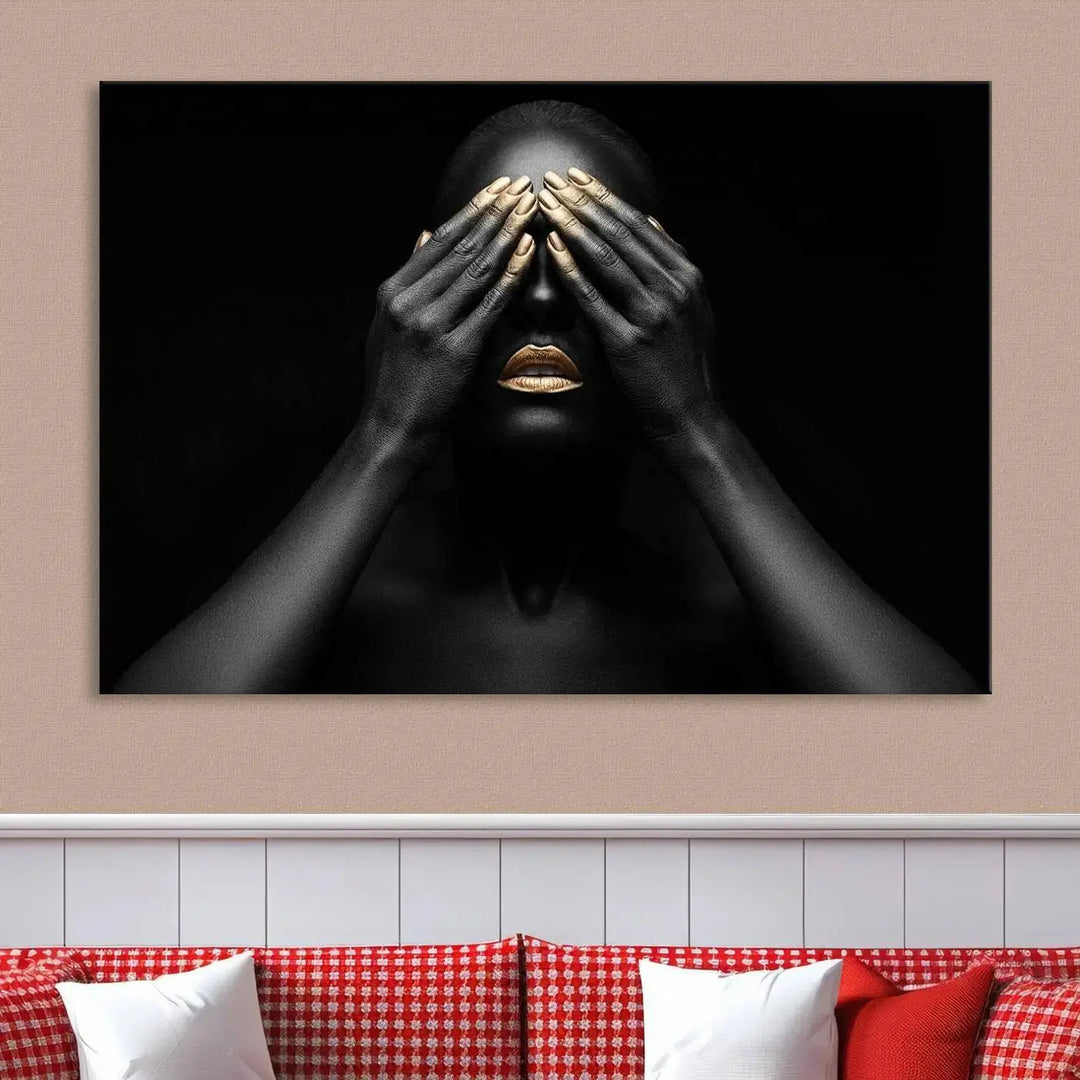 The African American Art Black and White Canvas Wall Art Gold Lips Art is a striking triptych featuring a woman with gold lips and nails covering her eyes.