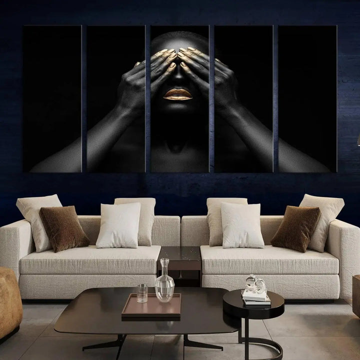 The African American Art Black and White Canvas Wall Art Gold Lips Art is a striking triptych featuring a woman with gold lips and nails covering her eyes.