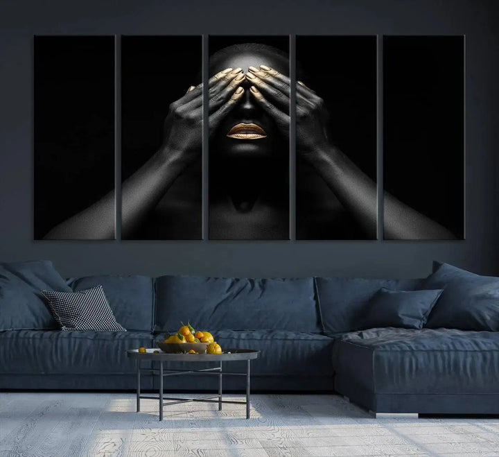 The African American Art Black and White Canvas Wall Art Gold Lips Art is a striking triptych featuring a woman with gold lips and nails covering her eyes.