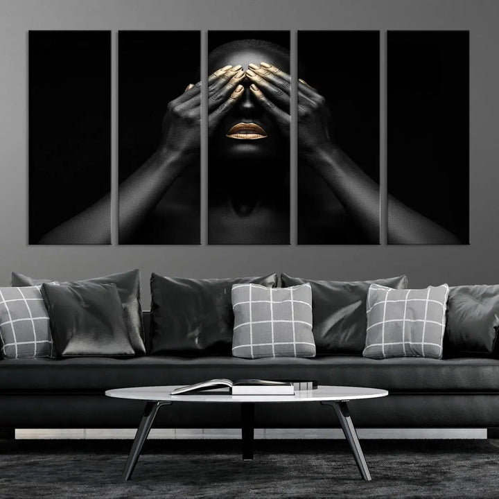 The African American Art Black and White Canvas Wall Art Gold Lips Art is a striking triptych featuring a woman with gold lips and nails covering her eyes.