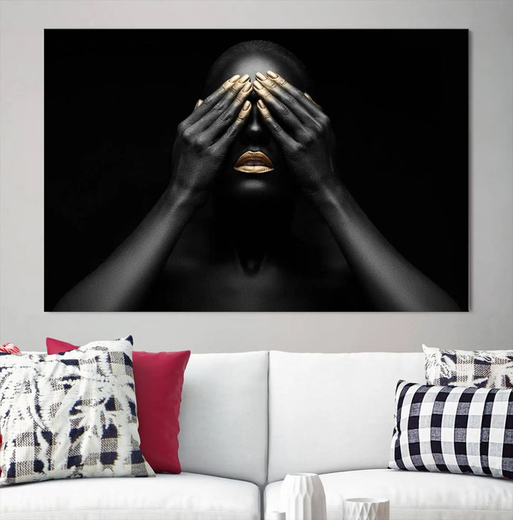 The African American Art Black and White Canvas Wall Art Gold Lips Art is a striking triptych featuring a woman with gold lips and nails covering her eyes.