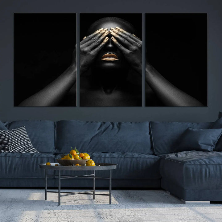 The African American Art Black and White Canvas Wall Art Gold Lips Art is a striking triptych featuring a woman with gold lips and nails covering her eyes.