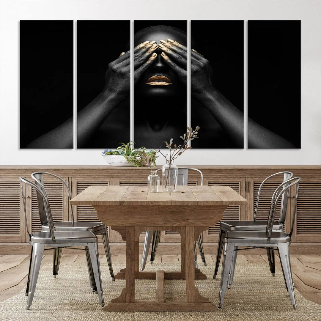 The African American Art Black and White Canvas Wall Art Gold Lips Art is a striking triptych featuring a woman with gold lips and nails covering her eyes.