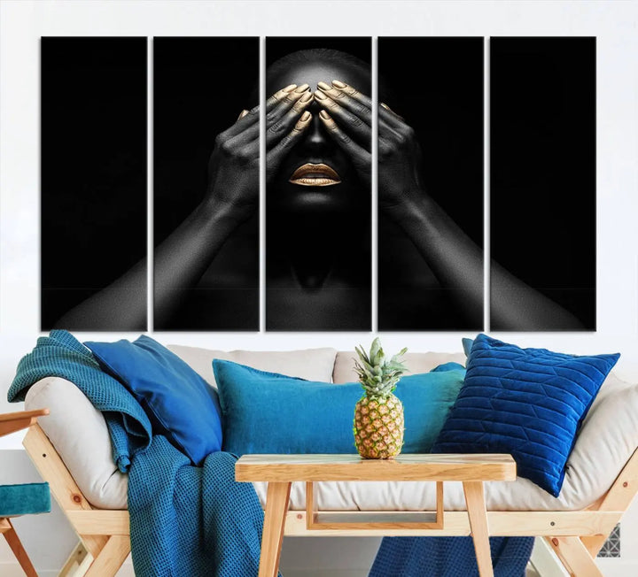 The African American Art Black and White Canvas Wall Art Gold Lips Art is a striking triptych featuring a woman with gold lips and nails covering her eyes.