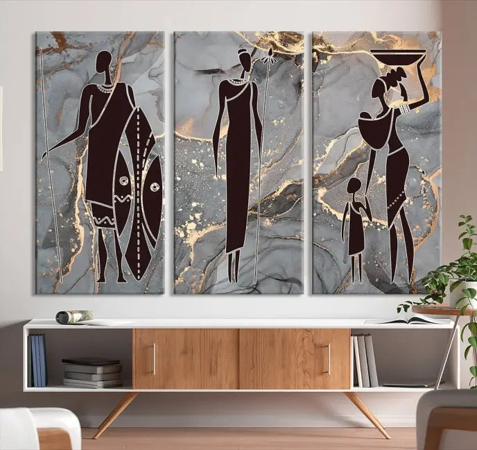 Discover the "African American Wall Art: African Women Painting Canvas Print," a stunning triptych that showcases silhouettes of African figures against abstract marble backgrounds in elegant gray and gold hues. This piece is crafted on museum-quality canvas, with each panel expertly gallery wrapped and coated with a UV-protective finish for long-lasting brilliance.