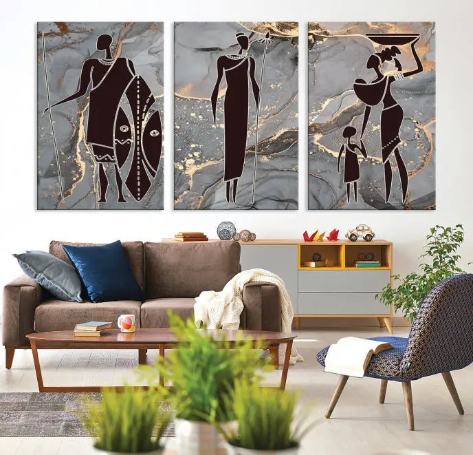 Discover the "African American Wall Art: African Women Painting Canvas Print," a stunning triptych that showcases silhouettes of African figures against abstract marble backgrounds in elegant gray and gold hues. This piece is crafted on museum-quality canvas, with each panel expertly gallery wrapped and coated with a UV-protective finish for long-lasting brilliance.