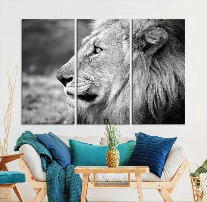 An African Lion Wall Art Canvas Print, featuring a black and white triptych of the lion's profile, is displayed above the modern couch.