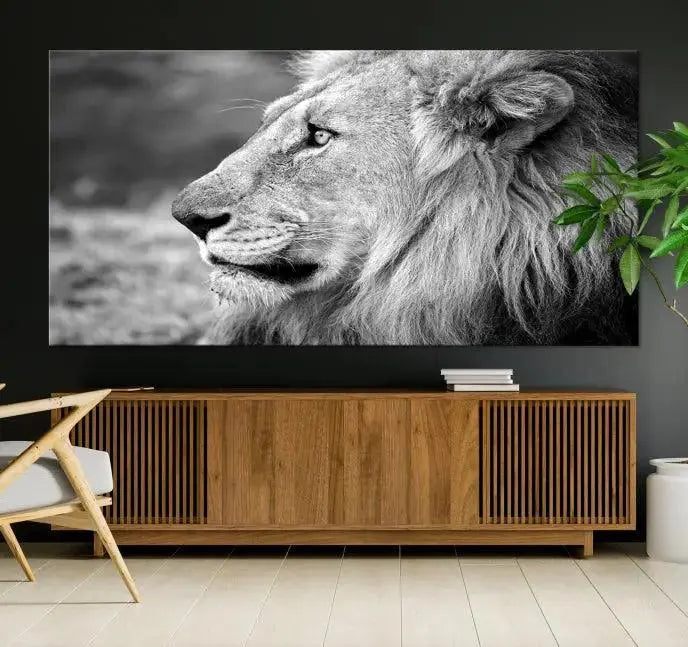 An African Lion Wall Art Canvas Print, featuring a black and white triptych of the lion's profile, is displayed above the modern couch.