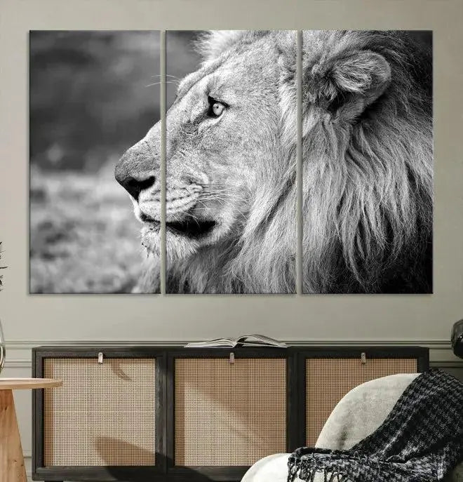 An African Lion Wall Art Canvas Print, featuring a black and white triptych of the lion's profile, is displayed above the modern couch.