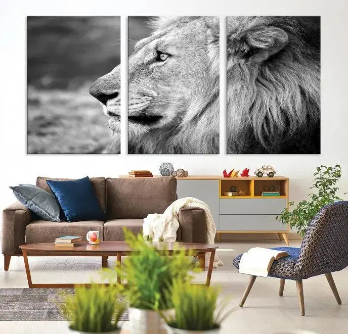 An African Lion Wall Art Canvas Print, featuring a black and white triptych of the lion's profile, is displayed above the modern couch.