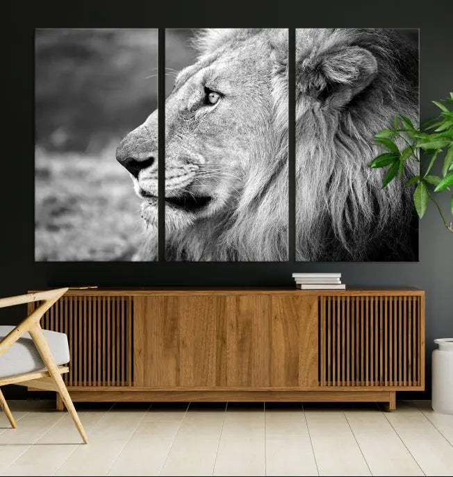 An African Lion Wall Art Canvas Print, featuring a black and white triptych of the lion's profile, is displayed above the modern couch.