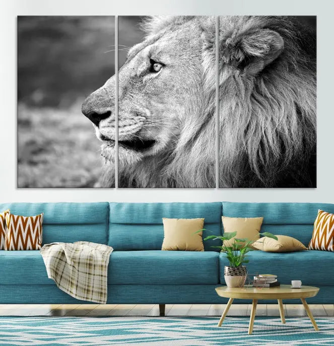 An African Lion Wall Art Canvas Print, featuring a black and white triptych of the lion's profile, is displayed above the modern couch.