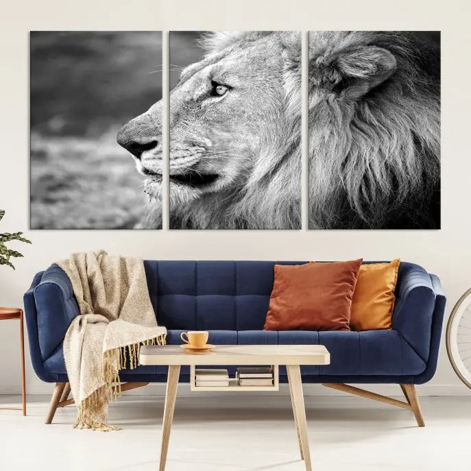 An African Lion Wall Art Canvas Print, featuring a black and white triptych of the lion's profile, is displayed above the modern couch.