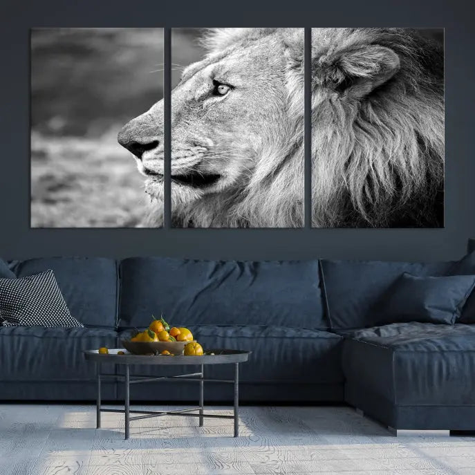 An African Lion Wall Art Canvas Print, featuring a black and white triptych of the lion's profile, is displayed above the modern couch.