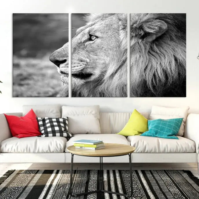 An African Lion Wall Art Canvas Print, featuring a black and white triptych of the lion's profile, is displayed above the modern couch.