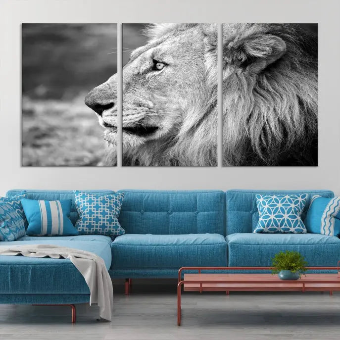 An African Lion Wall Art Canvas Print, featuring a black and white triptych of the lion's profile, is displayed above the modern couch.