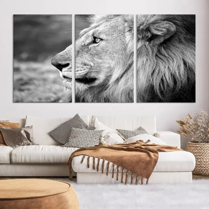 An African Lion Wall Art Canvas Print, featuring a black and white triptych of the lion's profile, is displayed above the modern couch.