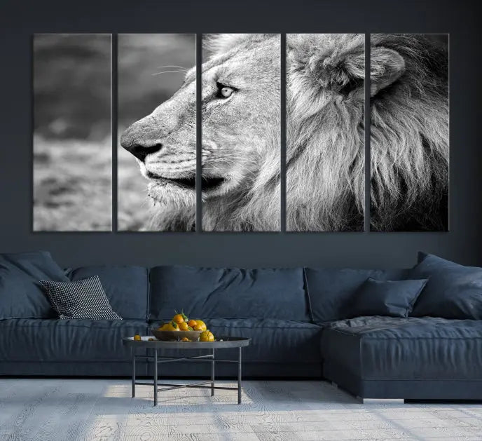 An African Lion Wall Art Canvas Print, featuring a black and white triptych of the lion's profile, is displayed above the modern couch.