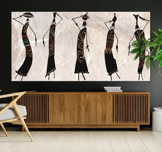 The "African Womens Wall Art Canvas Print," known for its intricate abstract figures, elegantly provides a museum-quality aesthetic.