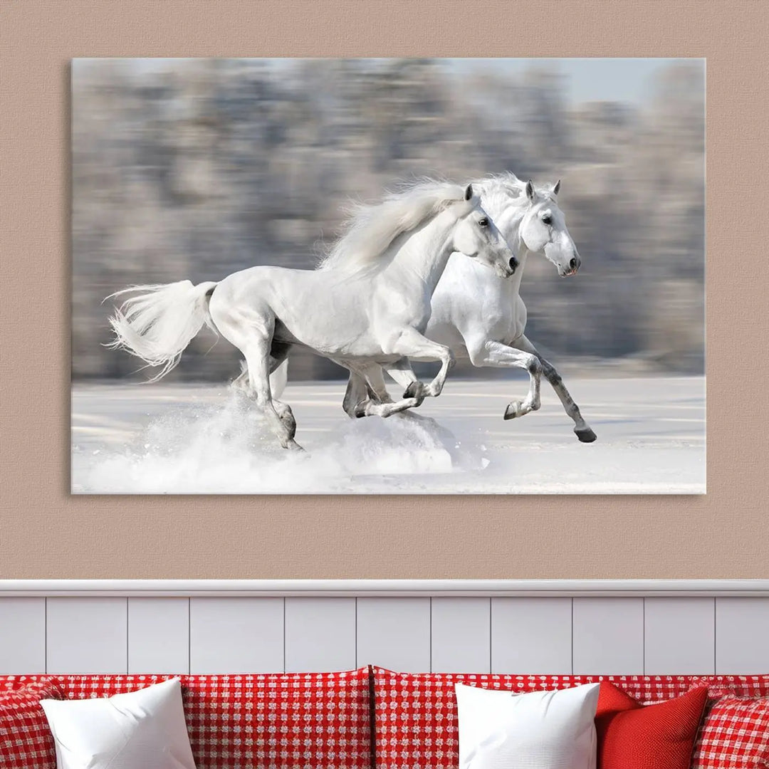 The "All The White Horses Wall Art Canvas Print" depicts a triptych of galloping white horses across a snowy landscape. These museum-quality canvases come with a UV-protective coating to maintain their stunning appearance over time.