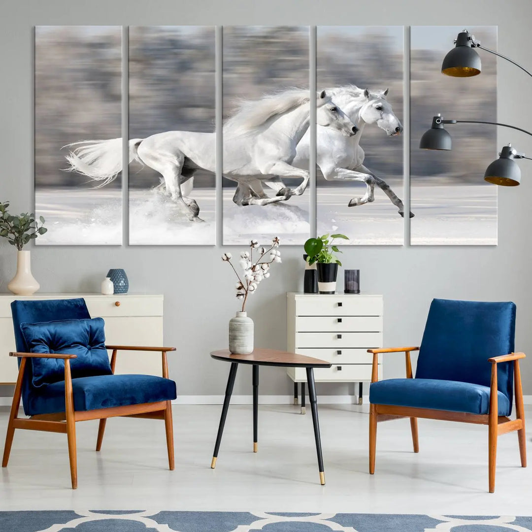 The "All The White Horses Wall Art Canvas Print" depicts a triptych of galloping white horses across a snowy landscape. These museum-quality canvases come with a UV-protective coating to maintain their stunning appearance over time.