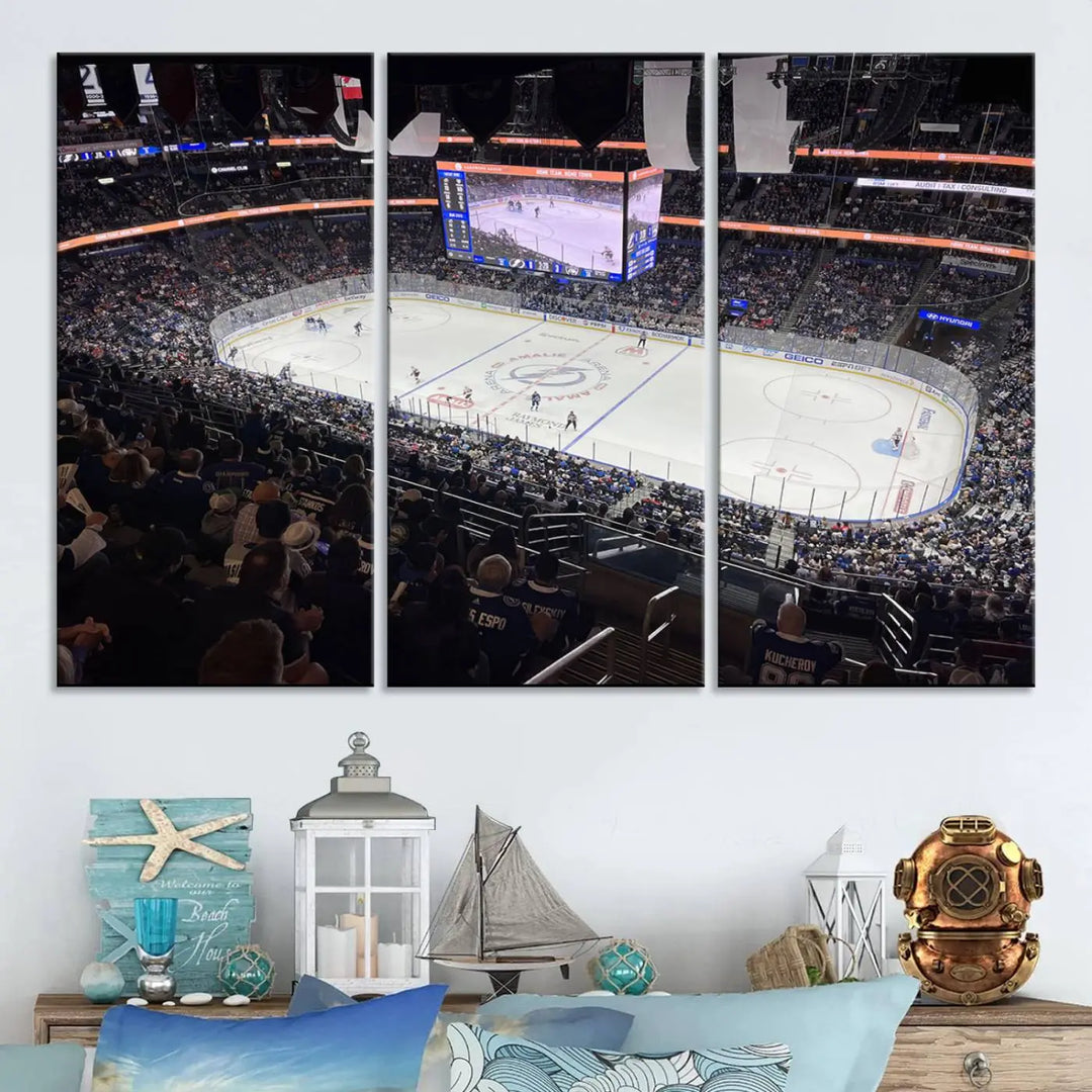 Displayed is the "Amalie Arena Florida Wall Art Canvas Print," a triptych featuring a packed NHL hockey stadium, printed in high resolution on museum-quality canvas.