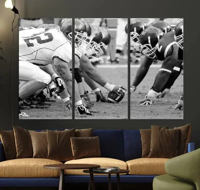 The "American Football Player Wall Art Canvas Print," beautifully rendered in black and white, captures a football scrimmage line and is printed on museum-quality canvas. This artwork is divided into three stunning panels and comes ready to hang for easy integration into your space.