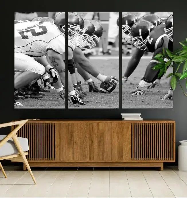 The "American Football Player Wall Art Canvas Print," beautifully rendered in black and white, captures a football scrimmage line and is printed on museum-quality canvas. This artwork is divided into three stunning panels and comes ready to hang for easy integration into your space.