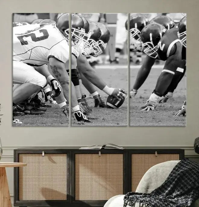 The "American Football Player Wall Art Canvas Print," beautifully rendered in black and white, captures a football scrimmage line and is printed on museum-quality canvas. This artwork is divided into three stunning panels and comes ready to hang for easy integration into your space.